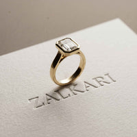 Velmira 2 CTW Emerald Cut Lab Grown Diamond Bezel Set Ring Gold