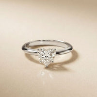 Diamond ring on a beige background White
