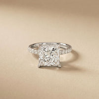 Diamond ring with a beige background White
