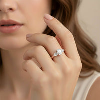 Silver Oval and Pear Moissanite Trilogy Ring