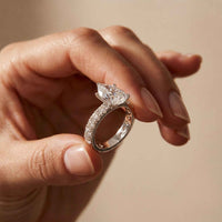 4.76 Ct Pear Moissanite Pavé Engagement Ring