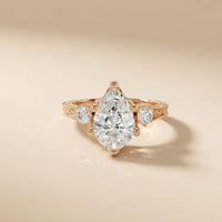 2.80 Ct Pear Moissanite Three Stone Engagement Ring Rose Gold