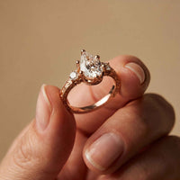 2.80 Ct Pear Moissanite Three Stone Engagement Ring Rose Gold