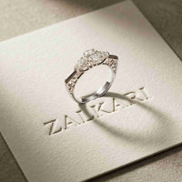 0.75 Ct Pear Moissanite Trilogy Elegance Ring