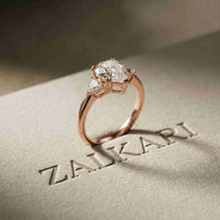 2.40 Ct Pear Cut Moissanite Three Stone Ring Rose Gold