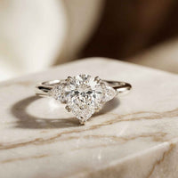 2.40 Ct Pear Cut Moissanite Three Stone Ring White