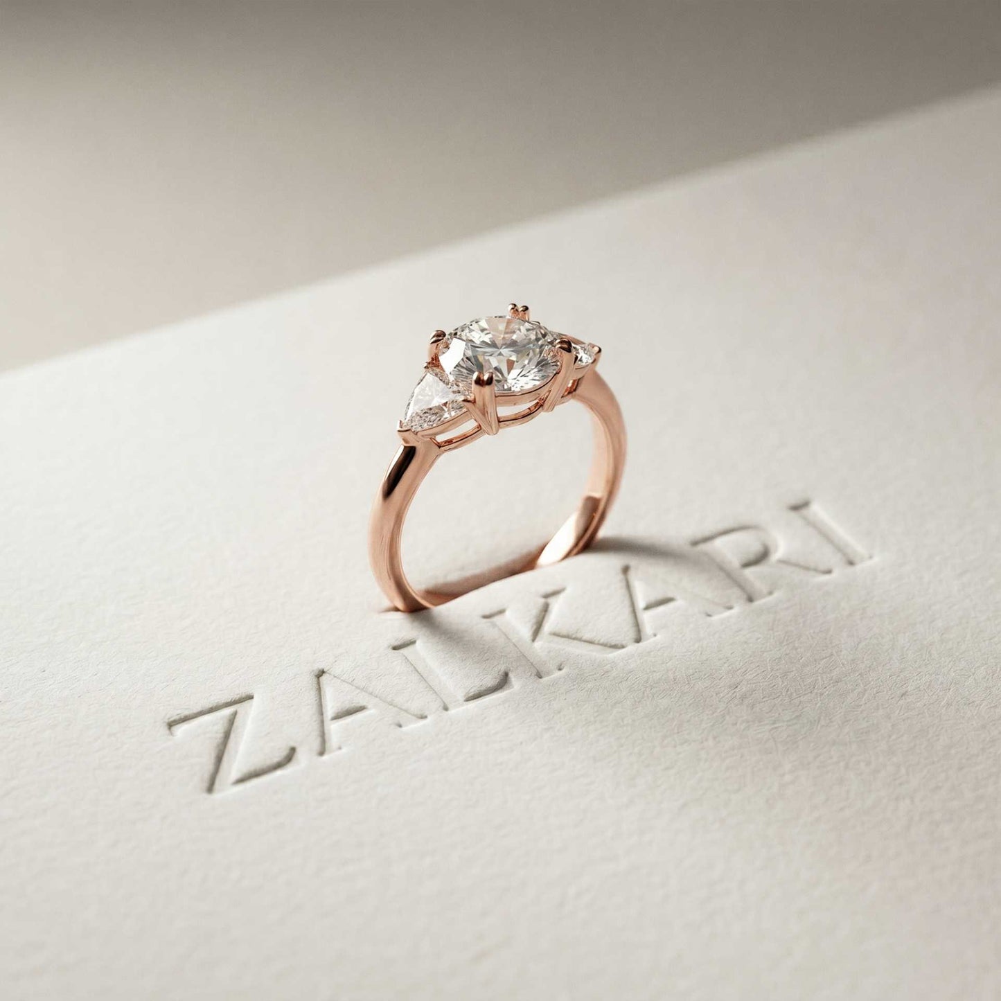2.3 Ct Round & Trillion Moissanite Three Stone Elegance Ring Rose Gold
