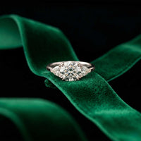 2.3 Ct Round & Trillion Moissanite Three Stone Elegance Ring