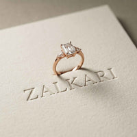 2.25 Ct Emerald & Pear Moissanite Trio Solitaire Ring