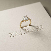 2.25 Ct Emerald & Pear Moissanite Trio Solitaire Ring