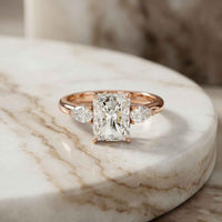 2.25 Ct Radiant & Pear Moissanite Three Stone Elegance Ring