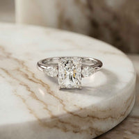 2.25 Ct Radiant & Pear Moissanite Three Stone Elegance Ring