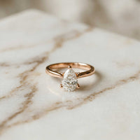 2.14 Ct Pear Moissanite Pavé Bridge Elegant Engagement Ring