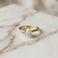 2.14 Ct Pear Moissanite Pavé Bridge Elegant Engagement Ring