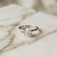 2.14 Ct Pear Moissanite Pavé Bridge Elegant Engagement Ring