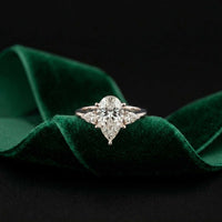 3.27 Ct Pear Moissanite with Pear Side Stones Graceful Fusion Engagement Ring