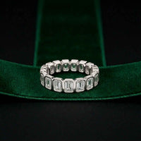 0.20 Ct Emerald Cut Bezel Set Sleek Band Ring