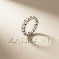 0.27 Ct Heart Cut Moissanite Shared Prong Eternity Band Ring
