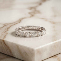0.06 Ct Emerald & Oval Moissanite Alternating Gallery Eternity Band