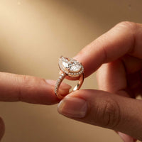 3.9 Ct Pear Cut Moissanite Halo Ring with Accent Stones