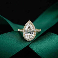 3.9 Ct Pear Cut Moissanite Halo Ring with Accent Stones