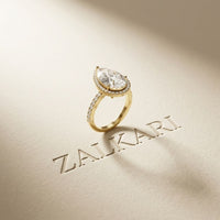 3.9 Ct Pear Cut Moissanite Halo Ring with Accent Stones