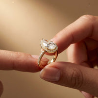3.9 Ct Pear Cut Moissanite Halo Ring with Accent Stones