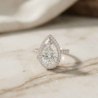 3.9 Ct Pear Cut Moissanite Halo Ring with Accent Stones