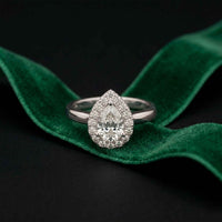 0.71 Ct Pear & Round Moissanite Halo Ring