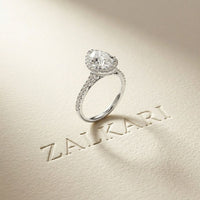 2.48 Ct Pear Cut Hidden Halo Cathedral Pavé Moissanite Ring
