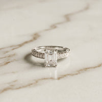 2.30 Ct Emerald Cut Moissanite Ornate Gallery Ring White