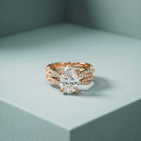 3.25 Ct Pear Cut Moissanite Crisscross Pavé Ring