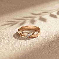 0.07 Ct Round Cut Criss-Cross Accent Moissanite Ring