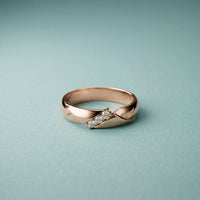 0.07 Ct Round Cut Criss-Cross Accent Moissanite Ring