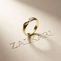 0.07 Ct Round Cut Criss-Cross Accent Moissanite Ring