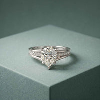 2.30 Ct Pear Cut Moissanite Tapered Pavé Engagement Ring