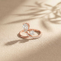 0.90 Ct Pear & Round Cut Moissanite Bypass Toi et Moi Ring
