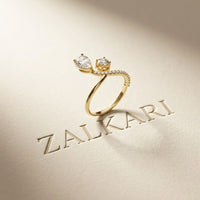 0.90 Ct Pear & Round Cut Moissanite Bypass Toi et Moi Ring