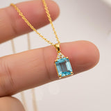 Silver Blue Topaz Emerald Cut Pendant