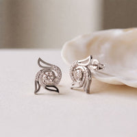 0.60 Ct Round Cut Lab Grown Diamond Floral Swirl Stud Earrings for Women White