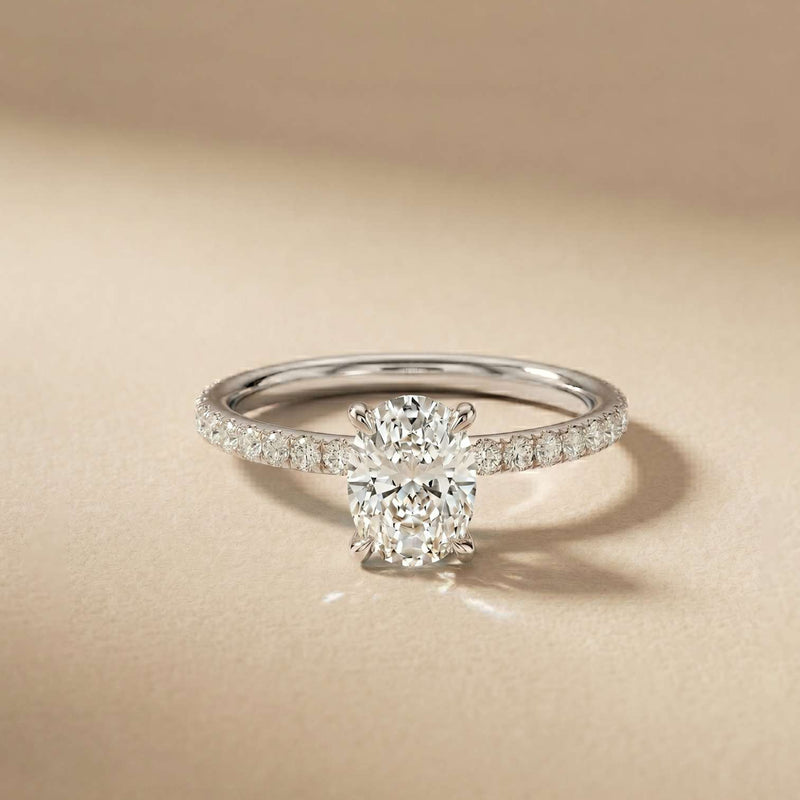 Diamond ring on a beige background White