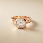 Rose gold ring with a diamond on a beige background Rose Gold