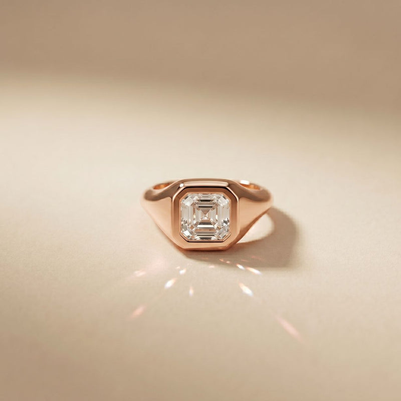 Rose gold ring with a diamond on a beige background Rose Gold
