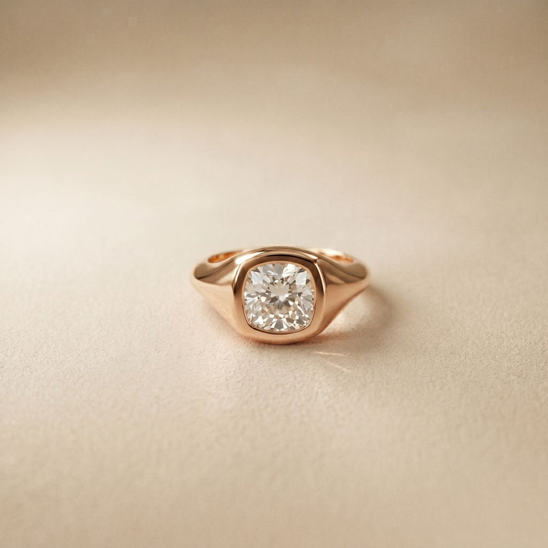 Rose gold ring with a diamond on a beige background Rose Gold
