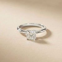Diamond ring on a beige background White