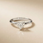 Diamond ring on a beige background White