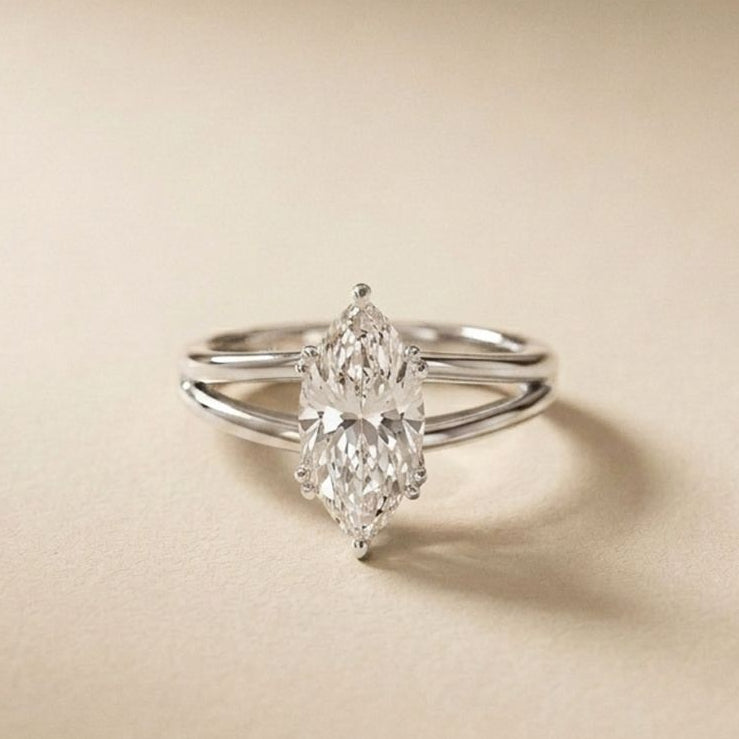 Diamond ring on a beige background White