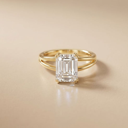 Gold ring with a large diamond on a beige background