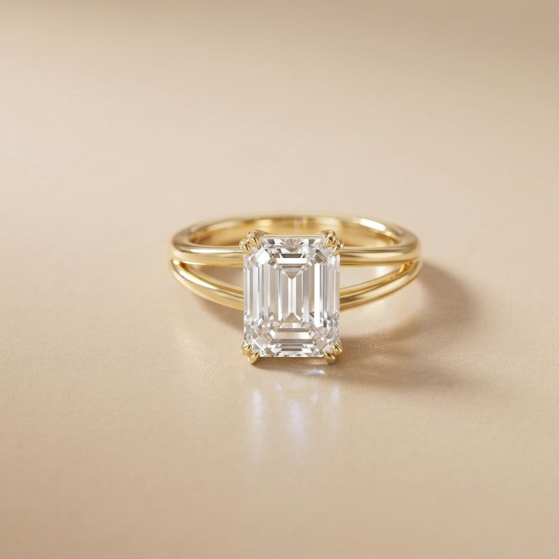 Gold ring with a large diamond on a beige background Gold