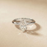 Lab Grown Diamond ring on a beige background White